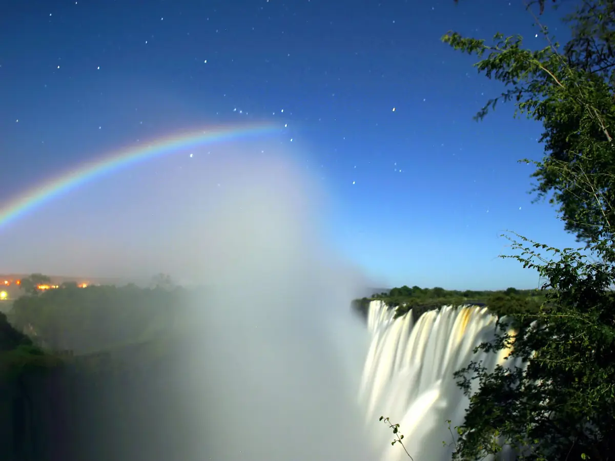 A lunar rainbow over Victoria Falls at night